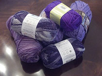 Tons of purple wool to keep our knitters working for epilepsy