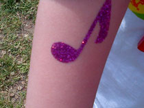 Purple Face and arm painting at the National Epilepsy Walk